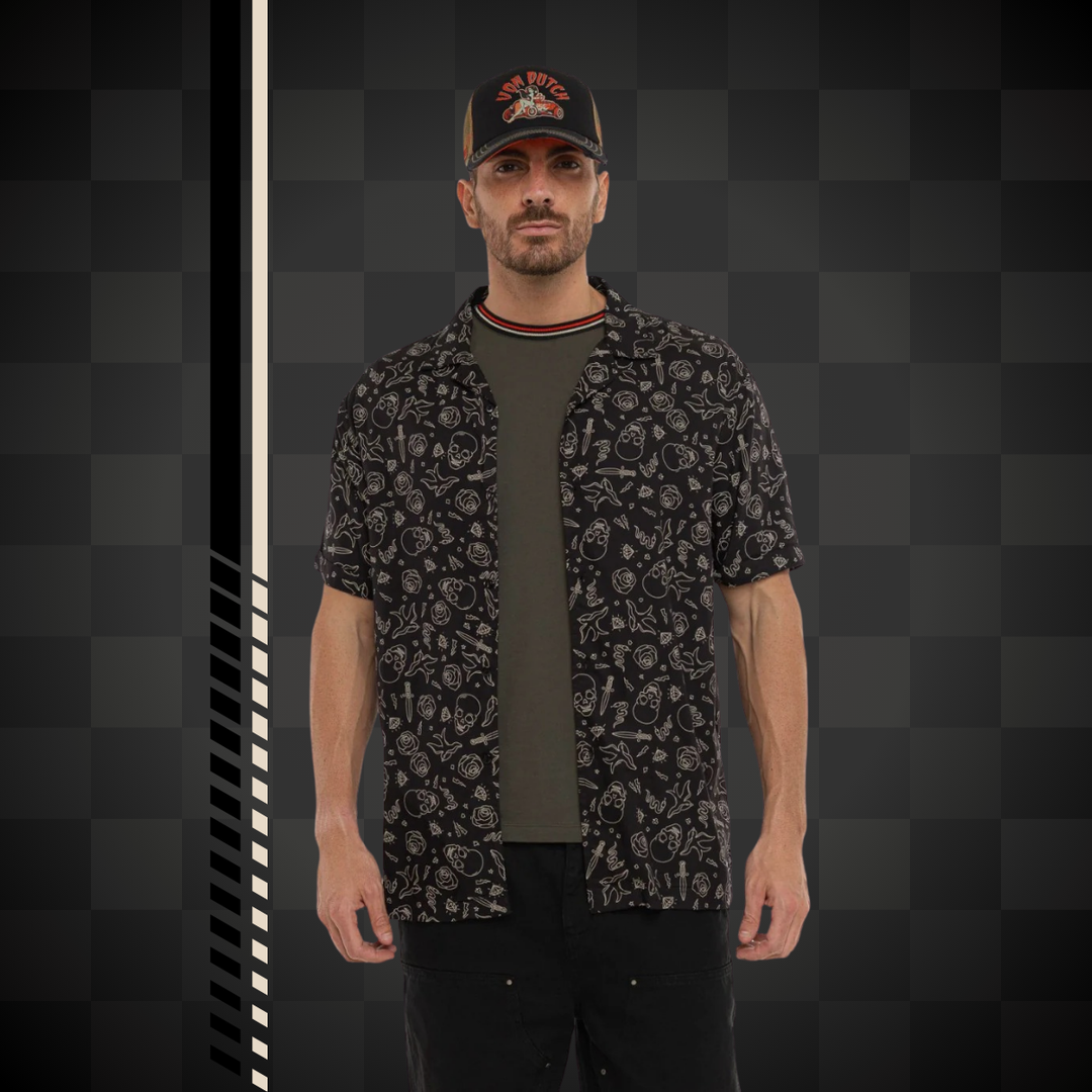 Von Dutch Chemisette "Tats" - Von Dutch Chemisette "Tats" - Von Dutch Chemise "Tats" en viscose 100% noir et blanc. Coupe régulière, manches courtes, fermeture bouton. -