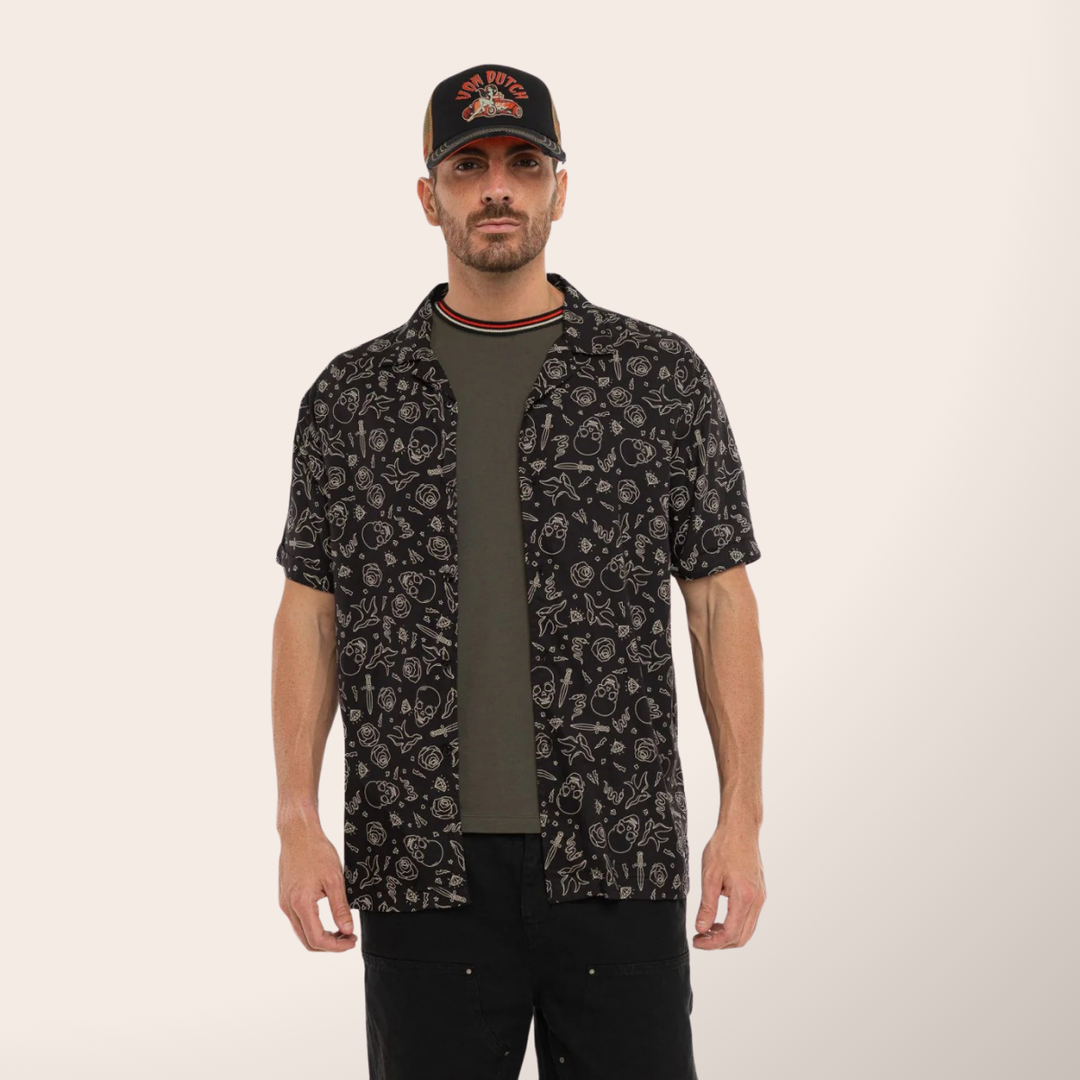 Von Dutch Chemisette "Tats" - Von Dutch Chemisette "Tats" - Von Dutch Chemise "Tats" en viscose 100% noir et blanc. Coupe régulière, manches courtes, fermeture bouton. -