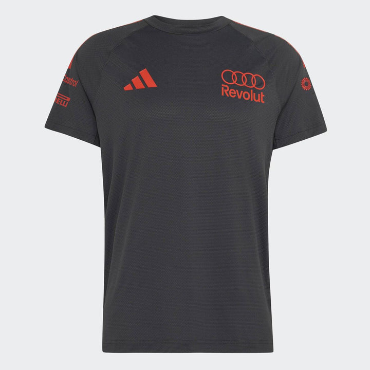 Revolut Audi F1 Team Tee Shirt Team 2026 Revolut Audi F1 Team Tee Shirt Team 2026 Portez les couleurs officielles de l'équipe Audi F1 avec ce t-shirt replica hommes. Logos d'équipe et partenaires. Esprit Pilote