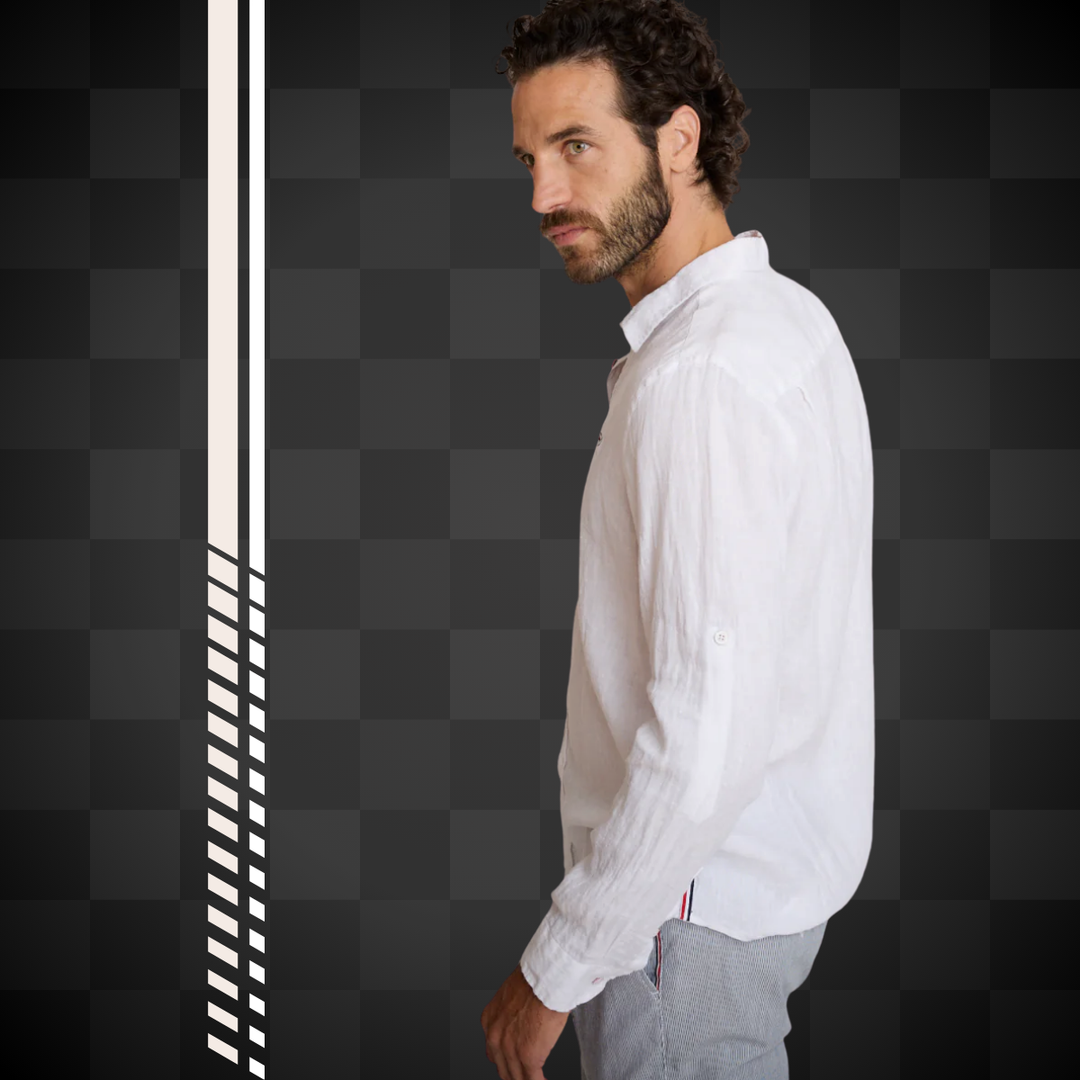 Affirmez votre look avec Delahaye Chemise 100% Lin Blanc - Chemise intemporelle en lin pur blanc, coupe régulière généreuse pour un confort optimal. Manches longues et broderie poitrine signature apportent une touche d'élégance discrète, tandis que le lis